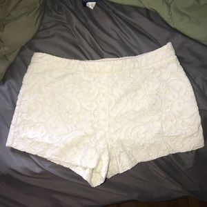 White floral shorts.